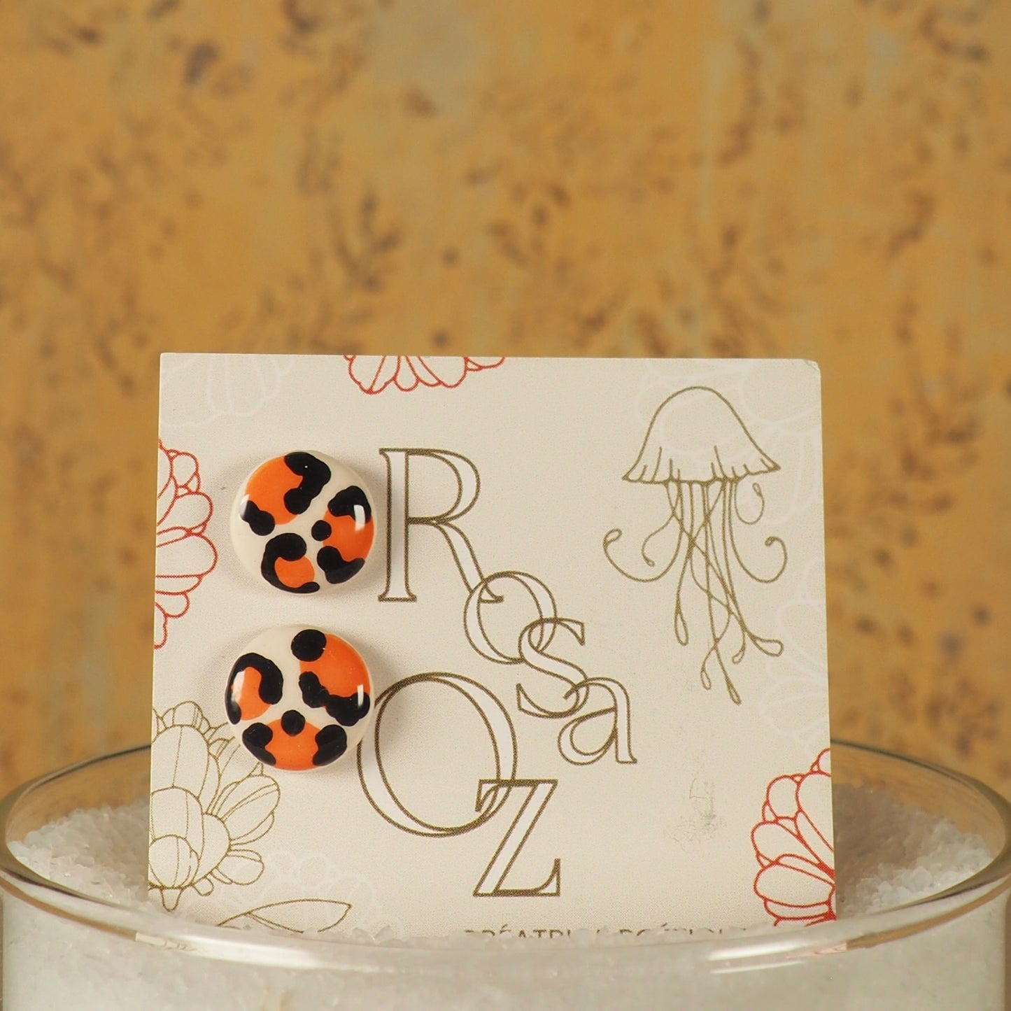 Puce léopard orange