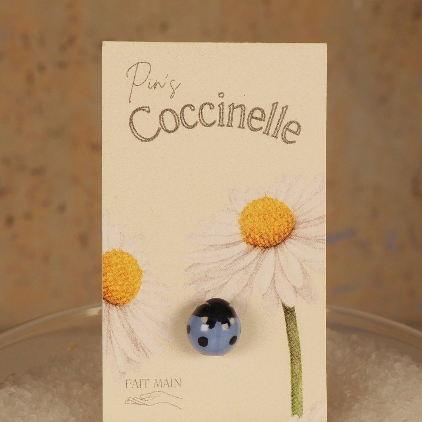Pin's Coccinelle bleu clair