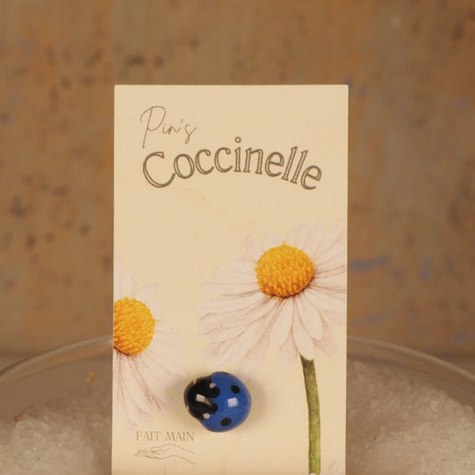 Pin's Coccinelle bleu foncé